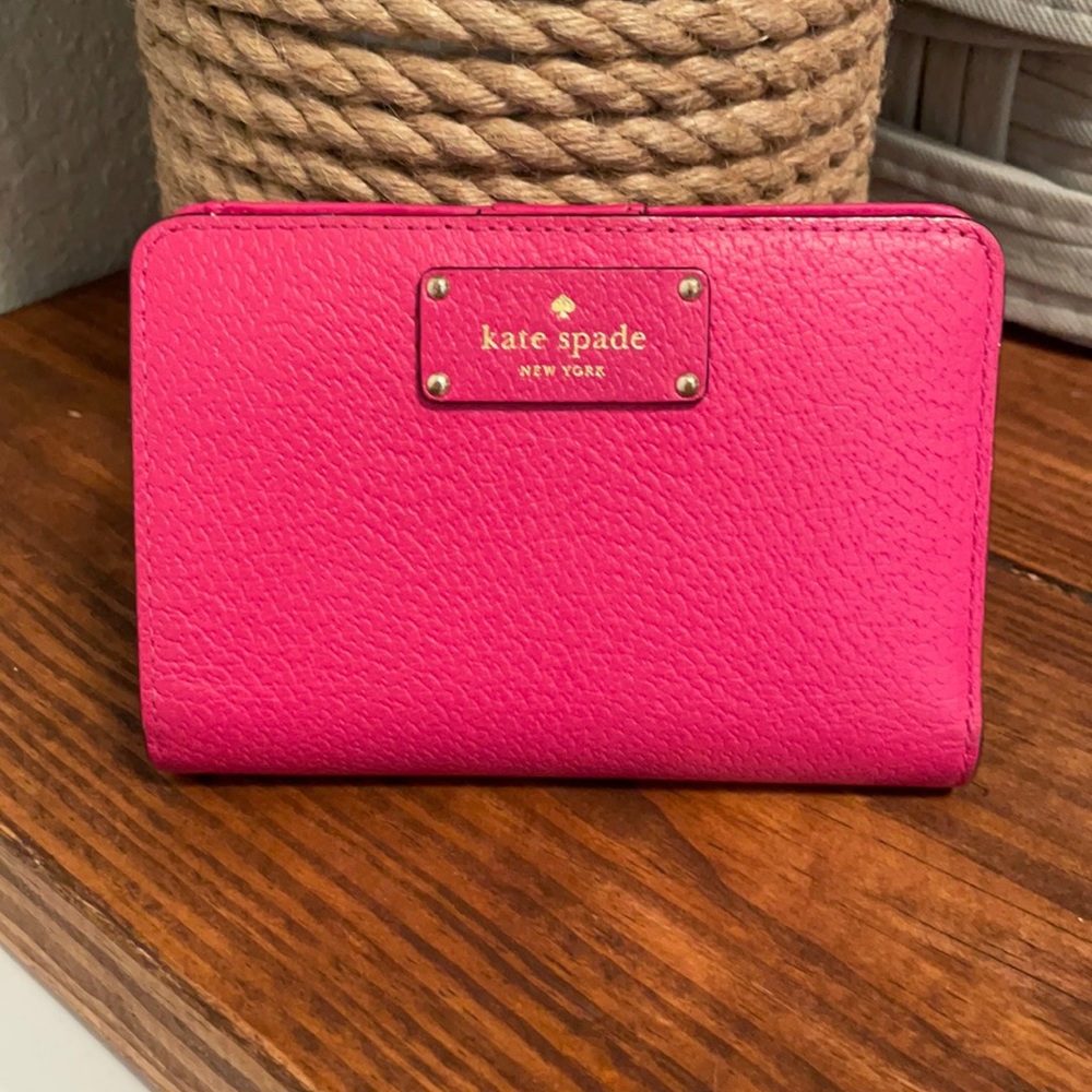 Pink wallet.